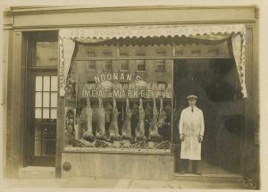 The legacy of SKy Park Farm Butcher. A Noonan stands proudly outside of his butcher shop.