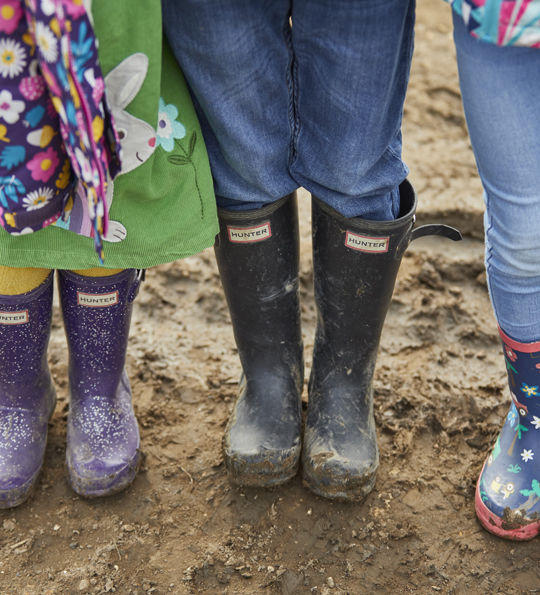 wellies in the mud at sky park farm become a deer friend