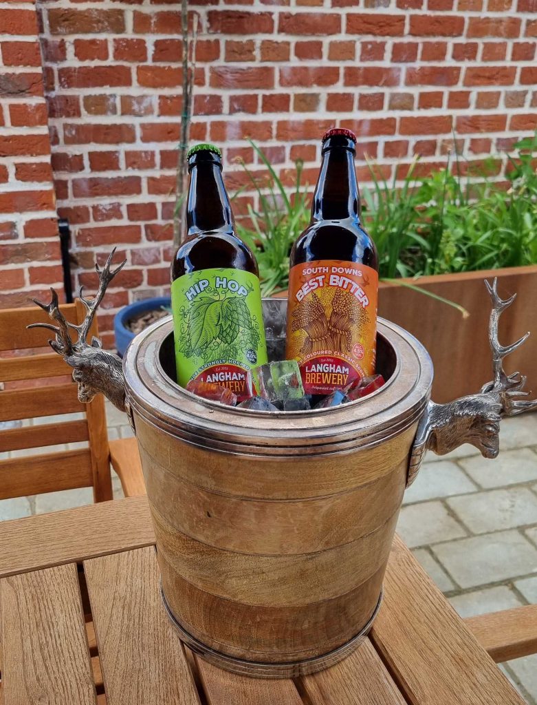 photo of two Langham beers in an ice bucket on a table